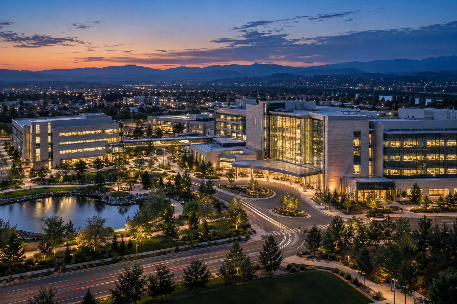 Regional hospital campus at dusk